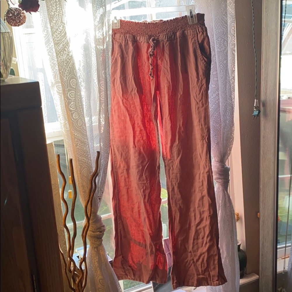 Coral colored ruched waisted pants
